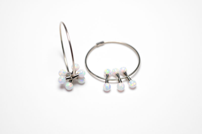 Hoops in white gold with white opals